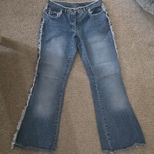 Distressed Light Blue Flare Jeans. Size 8